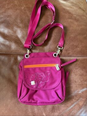 Haiku Fuchsia Crossbody Bag with Orange Zip Accent